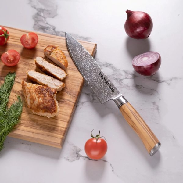 Engraved chef knife on a marble counter